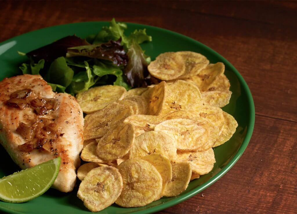 Natura chips on a plate with salmon